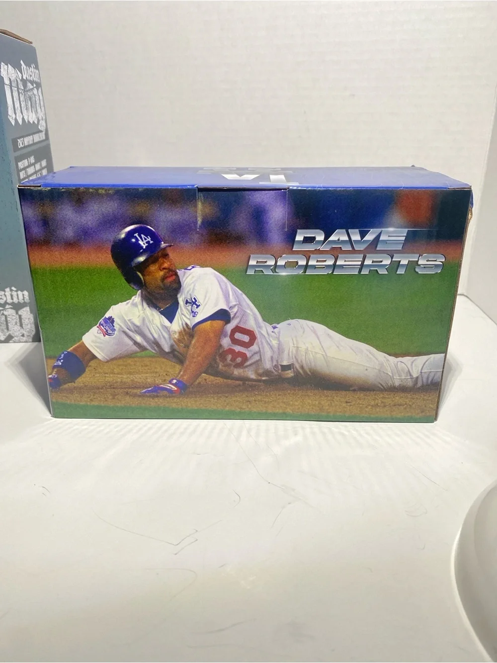 Dave Roberts and Dustin May bobble heads